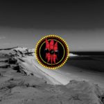 Willyama logo over black and white Australian beach.